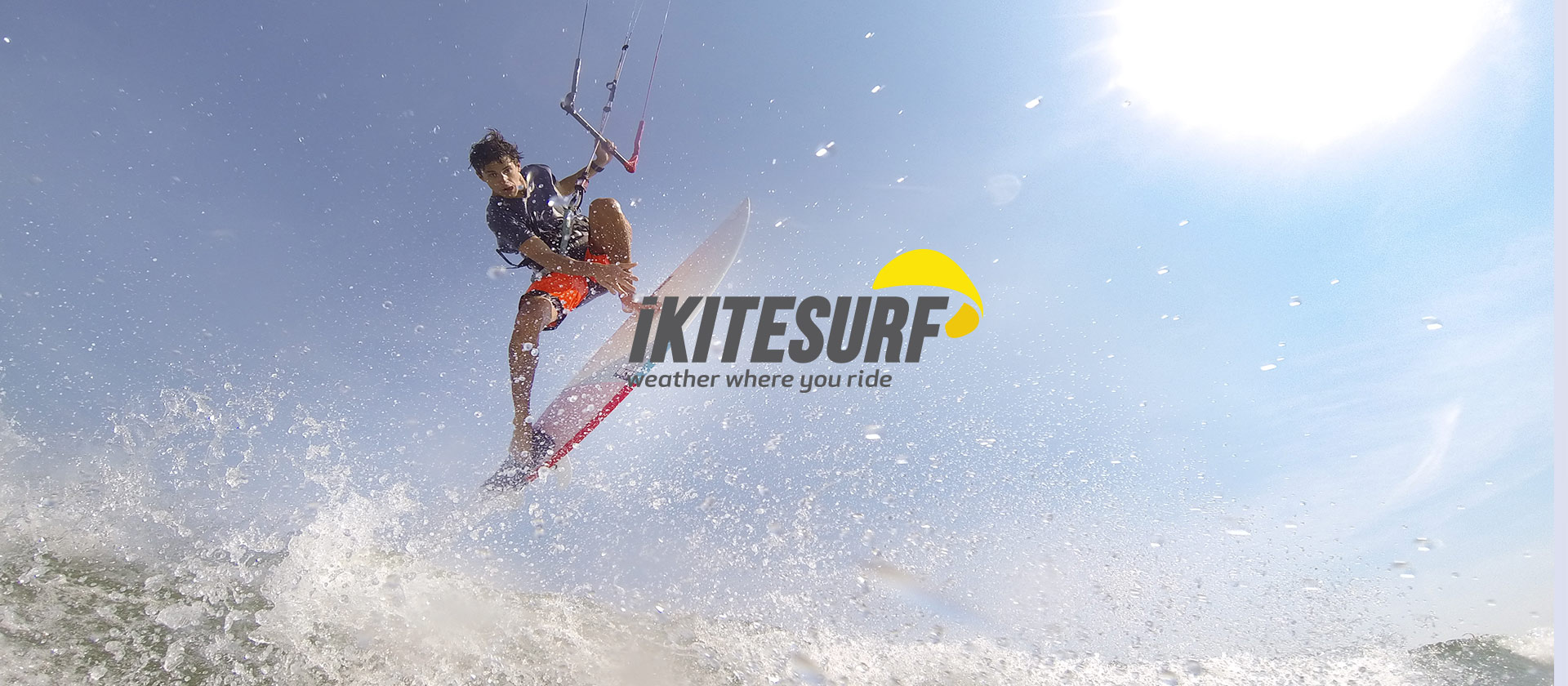 iKitesurf banner cover with a kitseurfer surfing on a wave in the air