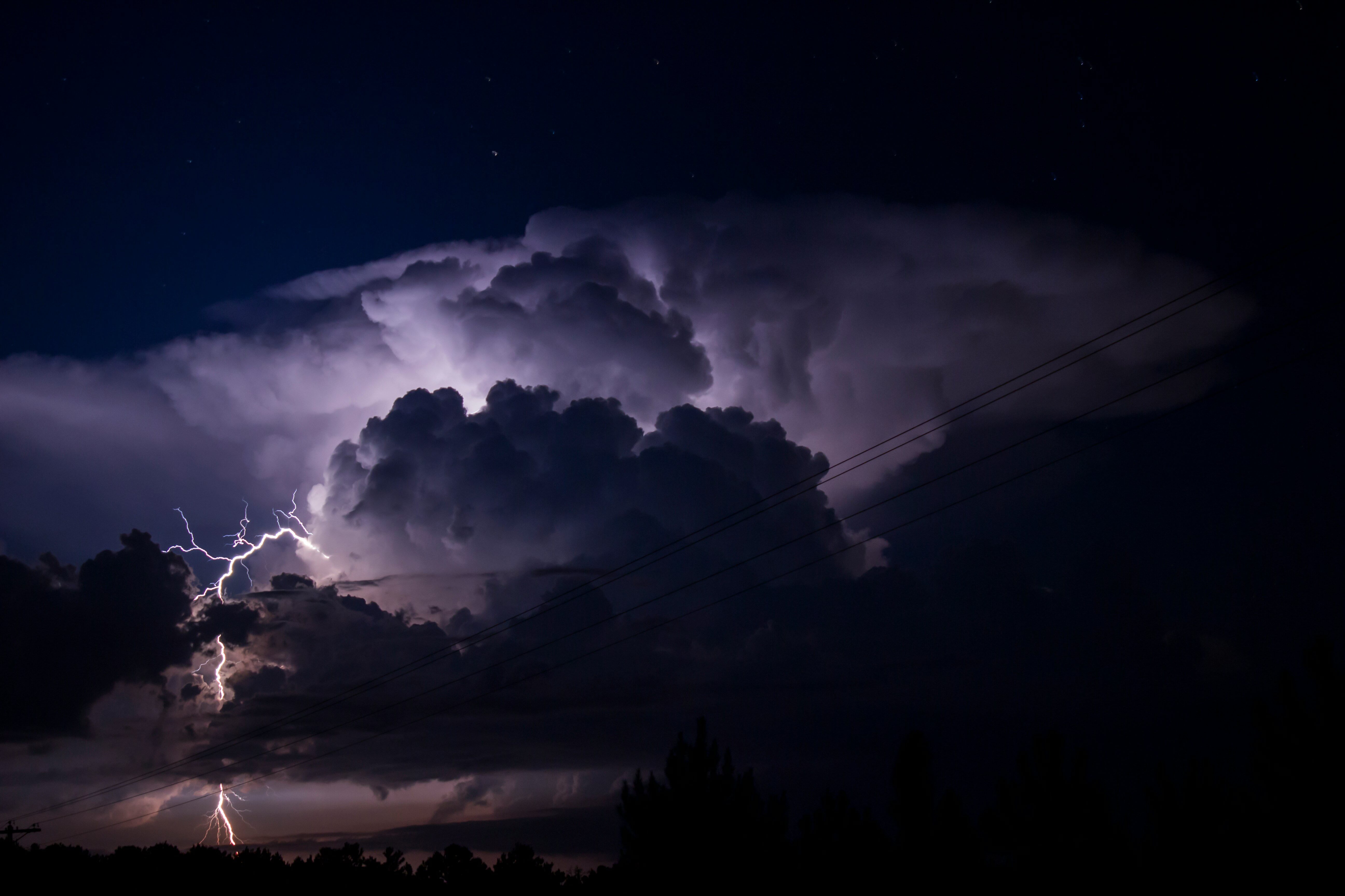 a lightning bolt hitting the ground from a cloud