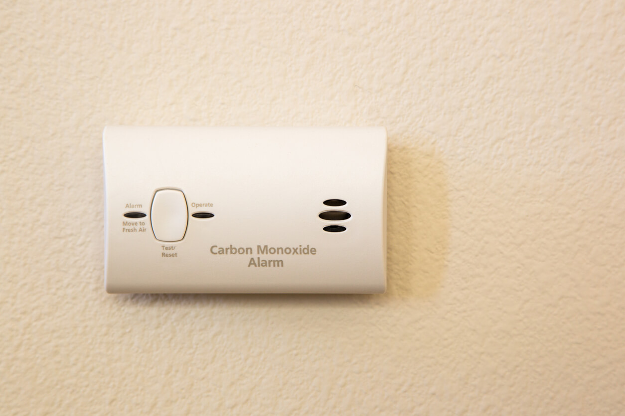 a carbon monoxide detector installed on a wall