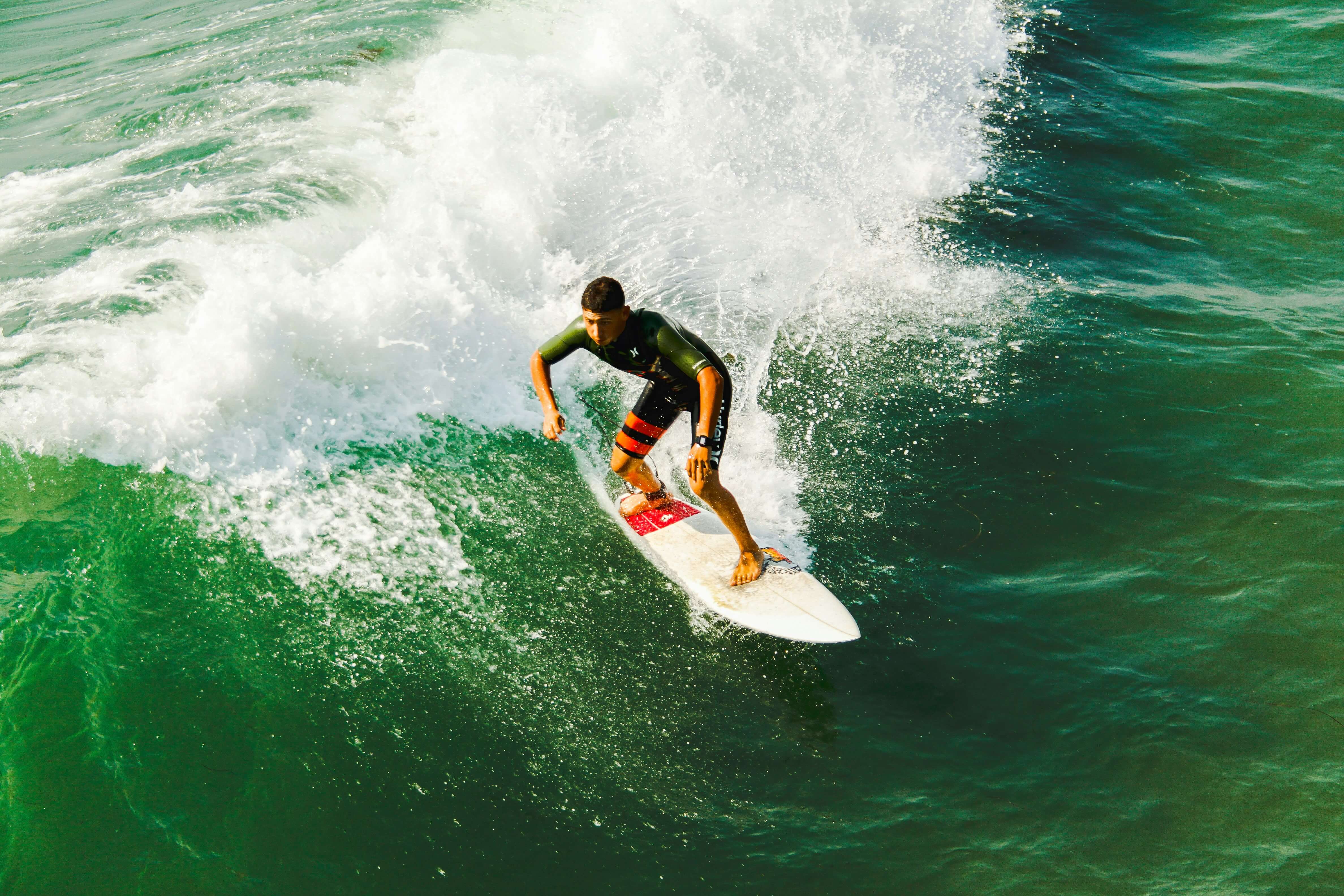 a surfer surfing on a wave