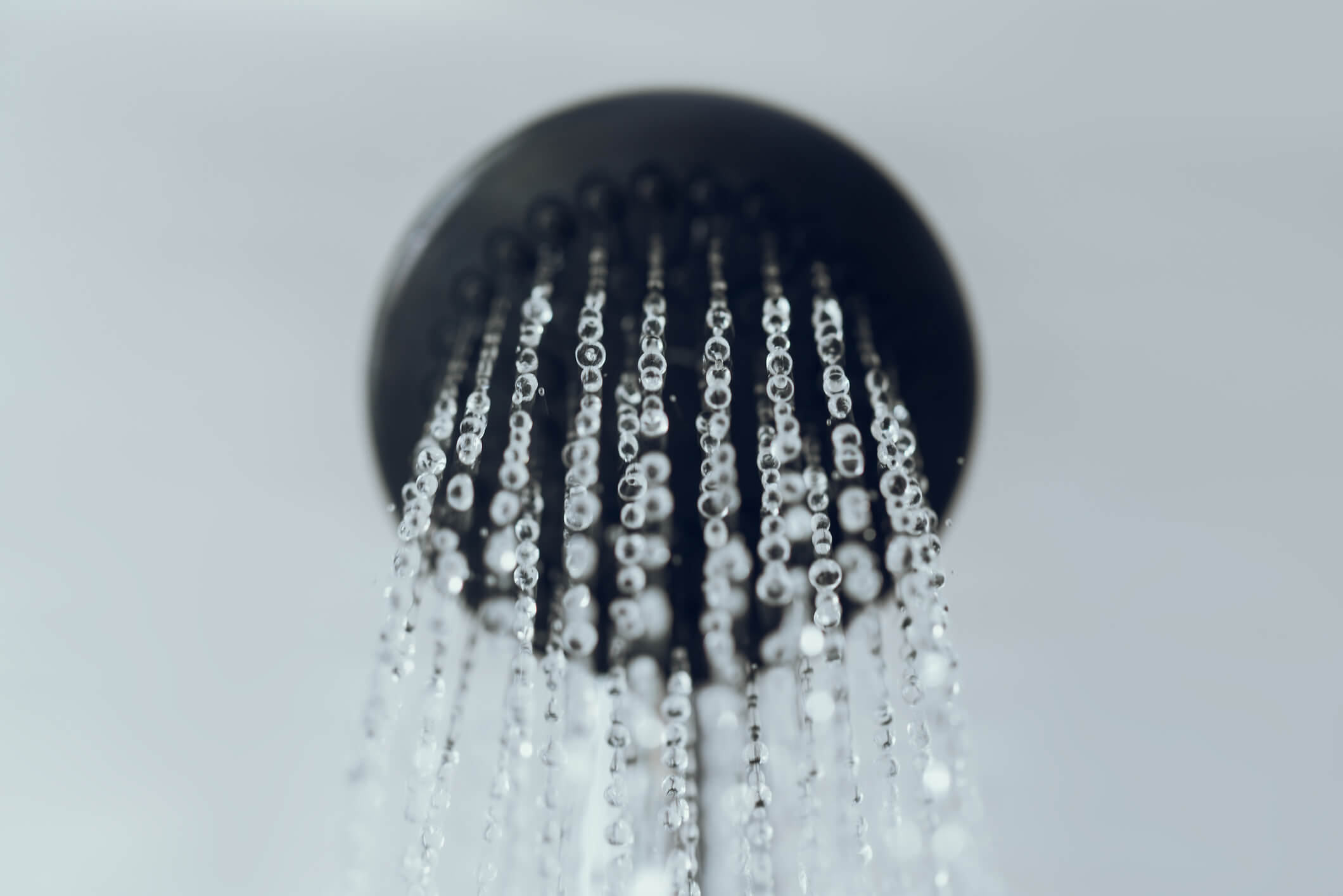 a shower head running water